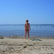 Смотрите пикантные фотографии женщины на пляже